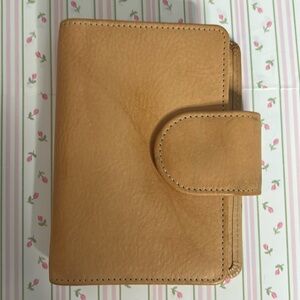 Vanderspek a6 undyed notebook covered with many upgrades.
